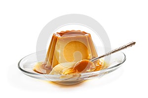 Creme caramel custard pudding isolated in white