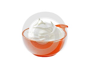 Creme fraiche in an orange bowl