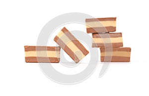 Cremino chocolate filled with hazelnut paste on white background.