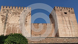 Crenelated thirteenth-century towers of the citadel in the Alhambra of Granada, Spain