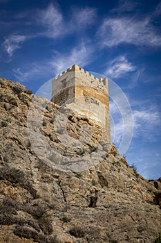 Crenellated Tower of Homenaje of the medieval castle of Alhama de Murcia photo