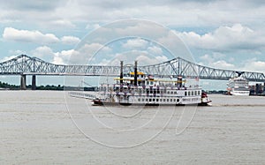 Creole Queen New Orleans Tour Boat on Mississippi River near Bridge