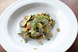 Creole salad with beans, chickpeas and zucchini photo