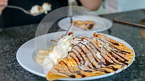 Crepe with banana and chocolate