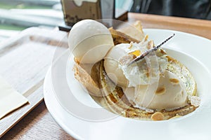 Crepe with ice cream and banana burned topping