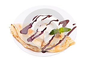 Crepe with ice cream and chocolate topping
