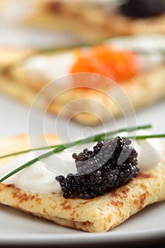 Crepes with caviar