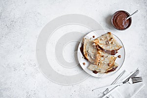 Crepes with chocolate and hazelnuts