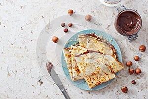 Crepes with chocolate and nuts