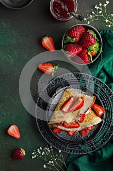 Crepes with cream cheese and fresh strawberry,