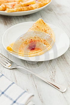 Crepes with fruit and cream