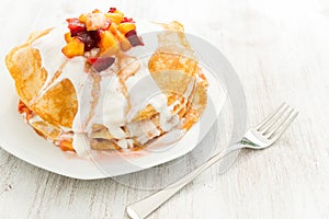 Crepes with fruit and cream