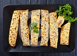 Crepes stuffed with chicken and cheese plate