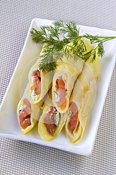Crepes stuffed with cream cheese and salted salmon