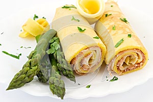 Crepes stuffed with ham and provolone sweet photo