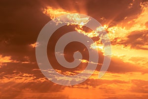 Crepuscular rays of the sun through dark clouds