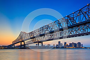 The Crescent City Connection Bridge on the Mississippi river photo