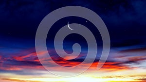 Crescent moon with beautiful sunset background . Generous Ramadan .