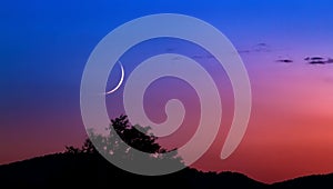 Crescent moon in the blue hour