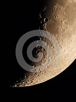 Crescent moon bottom edge impact crater closeup