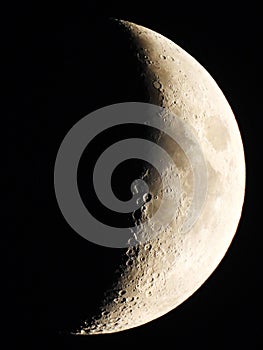 Crescent Moon with impact craters visible