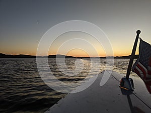 Crescent moon sunset boatride