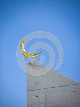 Crescent moon at the top of a minaret