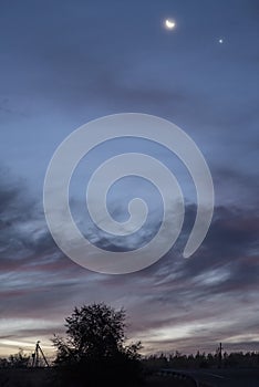Crescent moon and venus on a beautiful dawn background