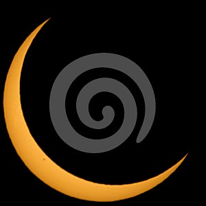Crescent sun during a solar eclipse