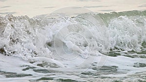 crest of the sea wave splash near shore