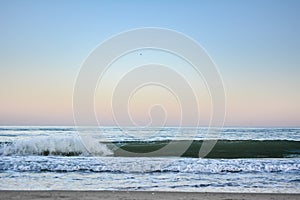 Crest of a wave in the Black Sea at sunset, selective focus. Sea waves background series images