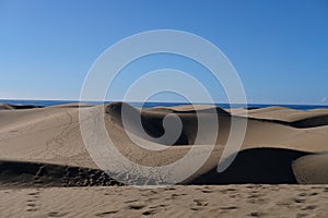 The crests of beautiful dunes and the deep shadows of Gran Canaria.