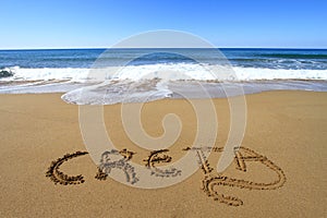 Creta written on the beach