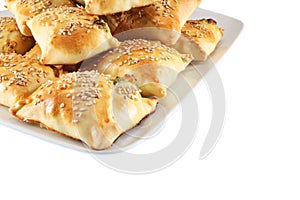 Cretan pies with sesame seeds