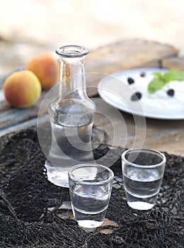 Cretan raki on a table photo