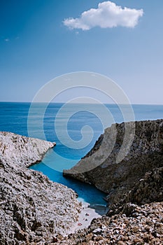 Crete Greece Seitan Limania beach with huge cliff by the blue ocean of the Island of Crete in Greece, Seitan limania