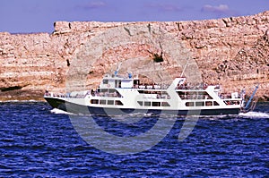 Crete or Kreta, Greece - September 15, 2017: Spirit of Athos ship passenger vessel sailing in the blue mediterranean sea against