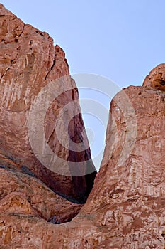 Crevice in Red Sandstone and Blue Sky photo