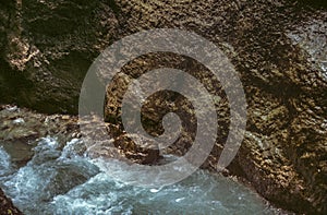 A Crevice of Rock and Bubbling Water in Partnachklamm Gorge in Summer