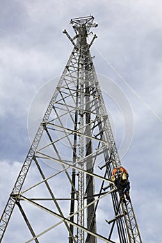 Crew installing antennas