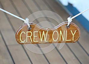 Crew only sign on a cruise ship