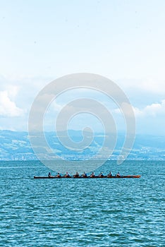 Crew Team in Competition water sport space for text minimalistic sunny day germany hard work