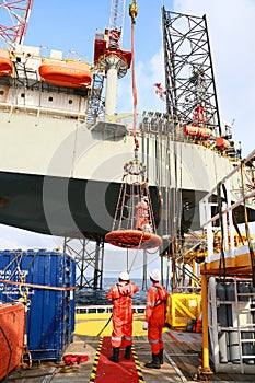 Crews boat moving the passenger and cargo from the platform to supply boat in oil and gas industry.