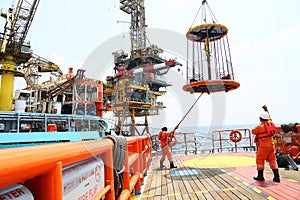 Crews boat moving the passenger and cargo from the platform to supply boat in oil and gas industry.