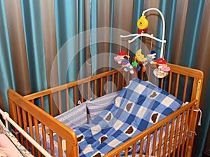 Crib and toy photo