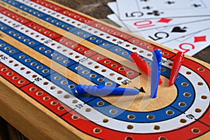 Cribbage board and playing cards