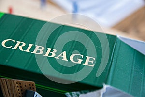 Cribbage, or crib, is a card game traditionally for two players that involves playing and grouping cards