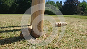 Cricket bails dislodged from a set of stumps