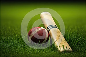 Cricket ball and bat on green grass of cricket pitch. Generative AI