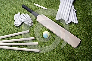 Cricket Bat And Ball On Turf Grass